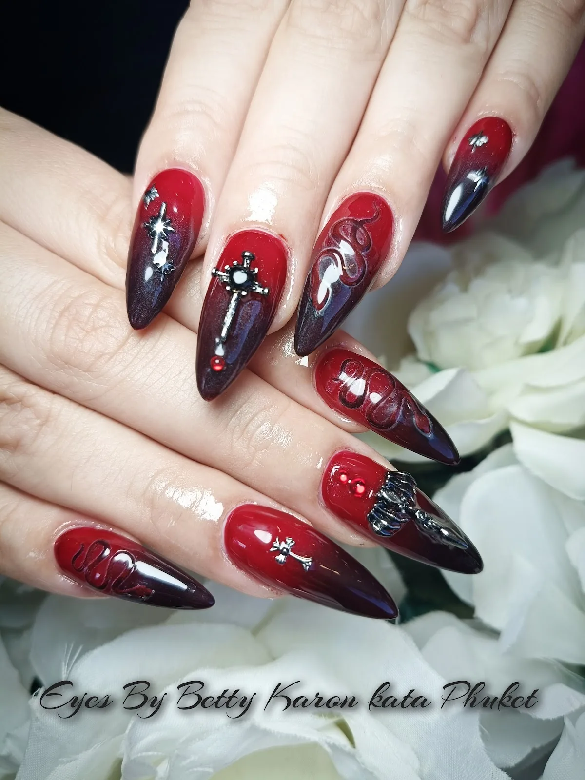 Glossy dark gel, sharp stiletto shape